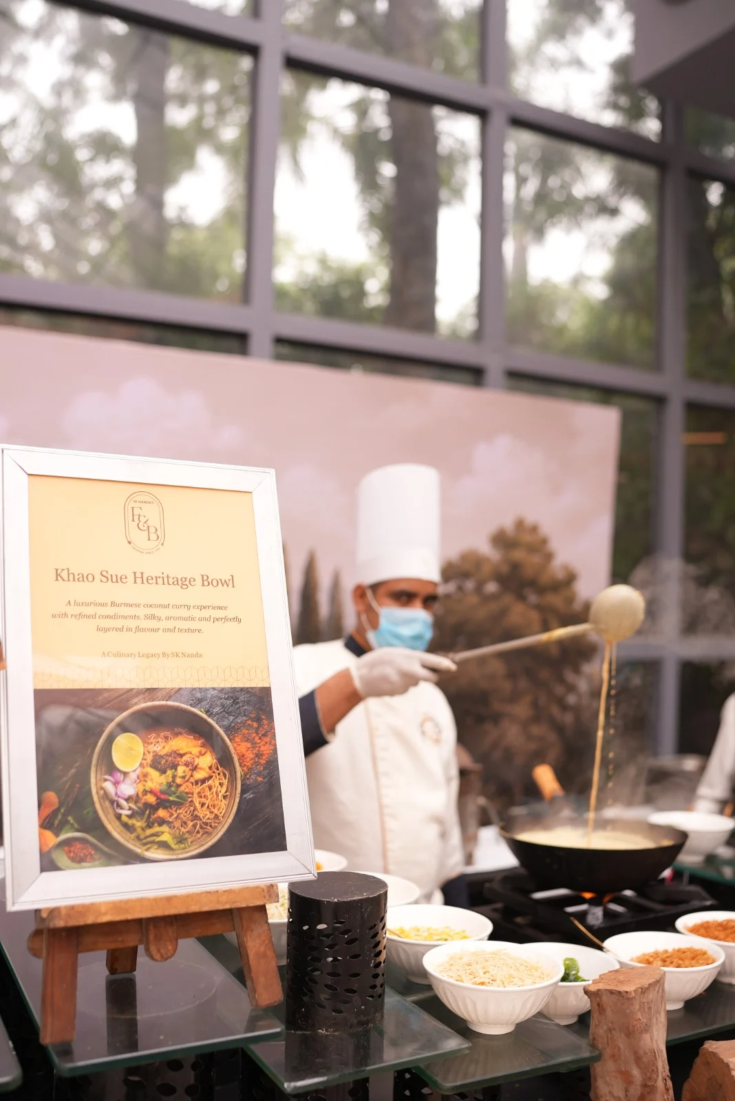 Chef preparing Khao Sue at a recent SK Nanda event