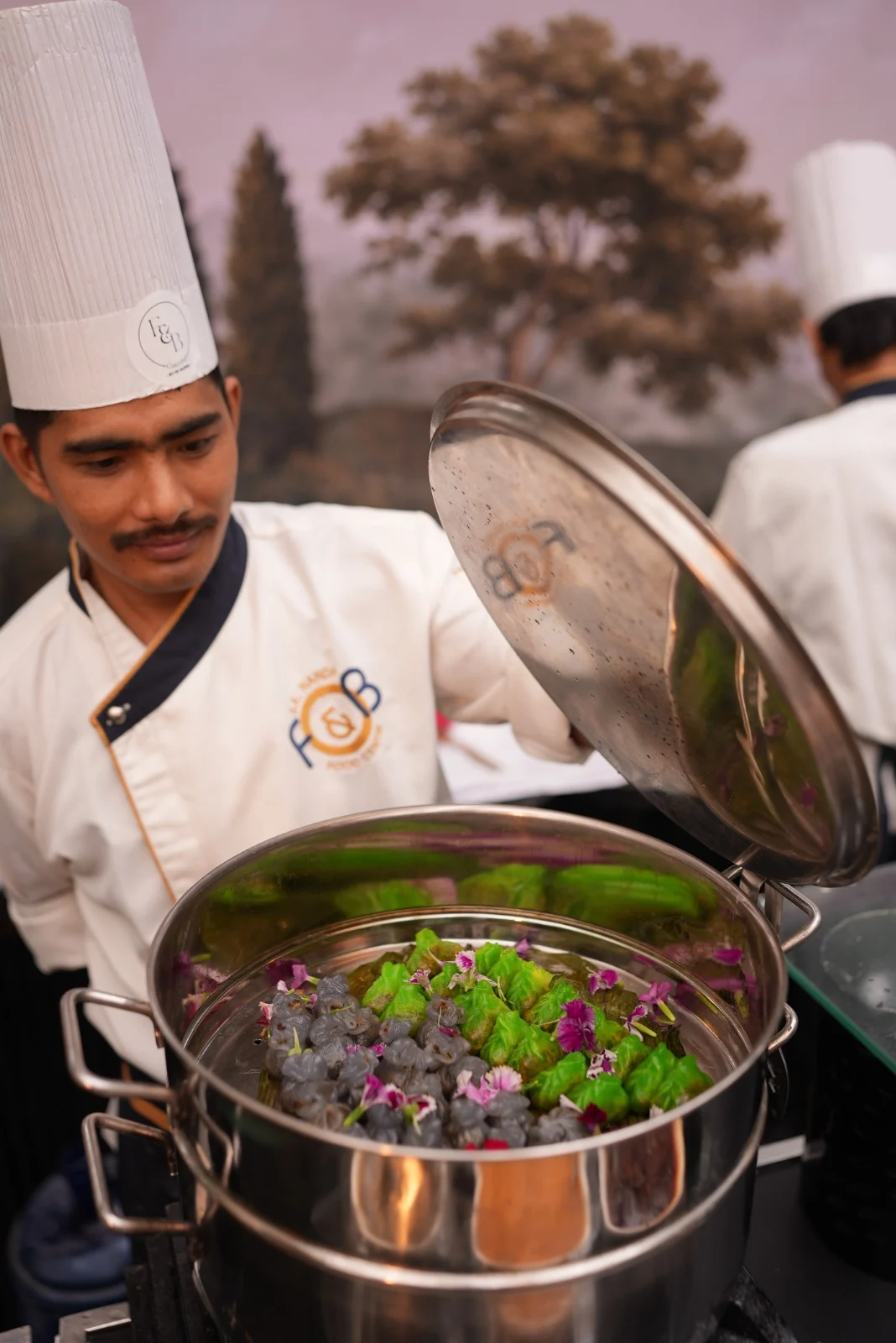 SK Nanda chef preparing a live station at a recent event